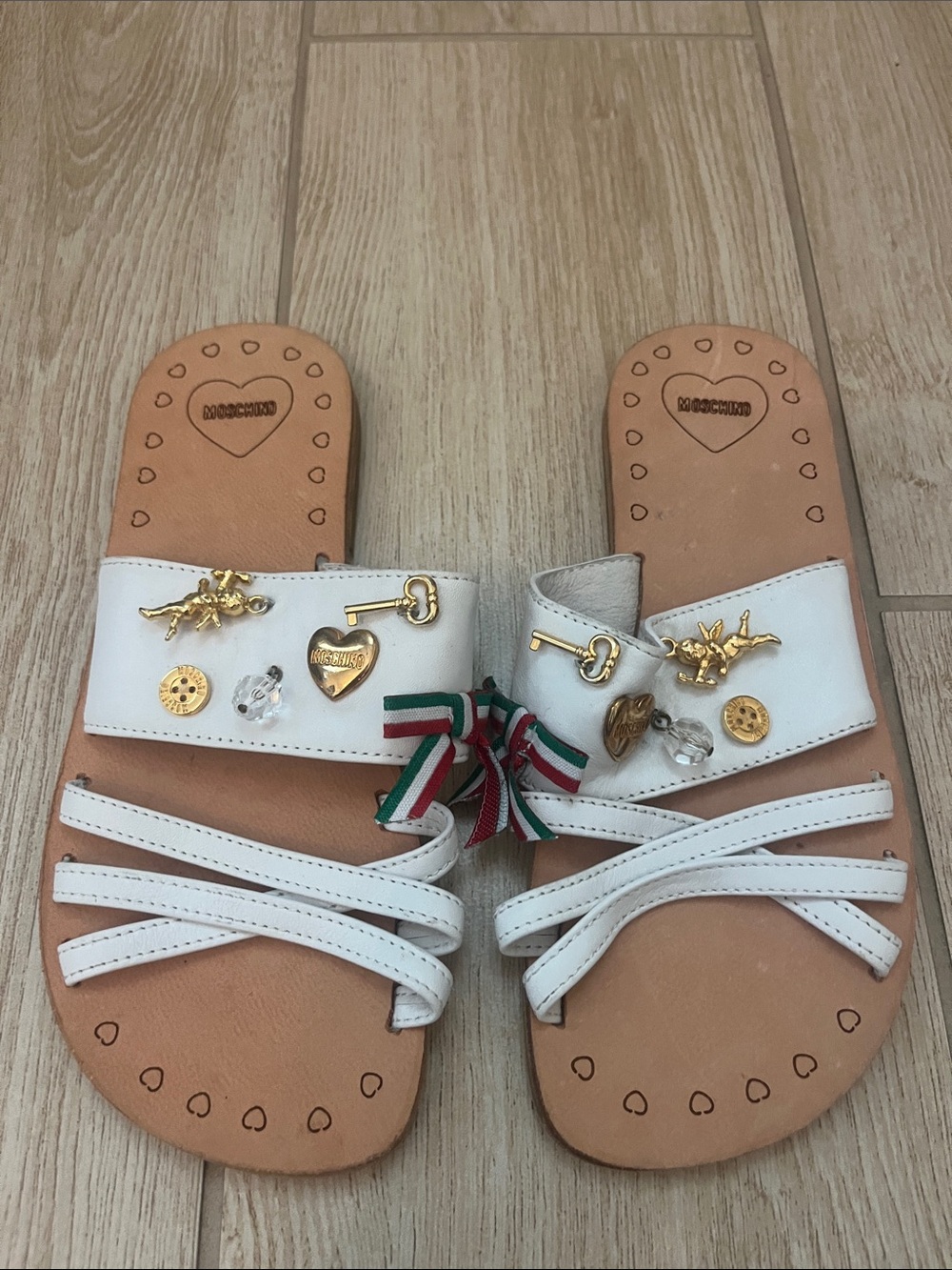 Moschino White Leather Slide Sandals with Gold Charms